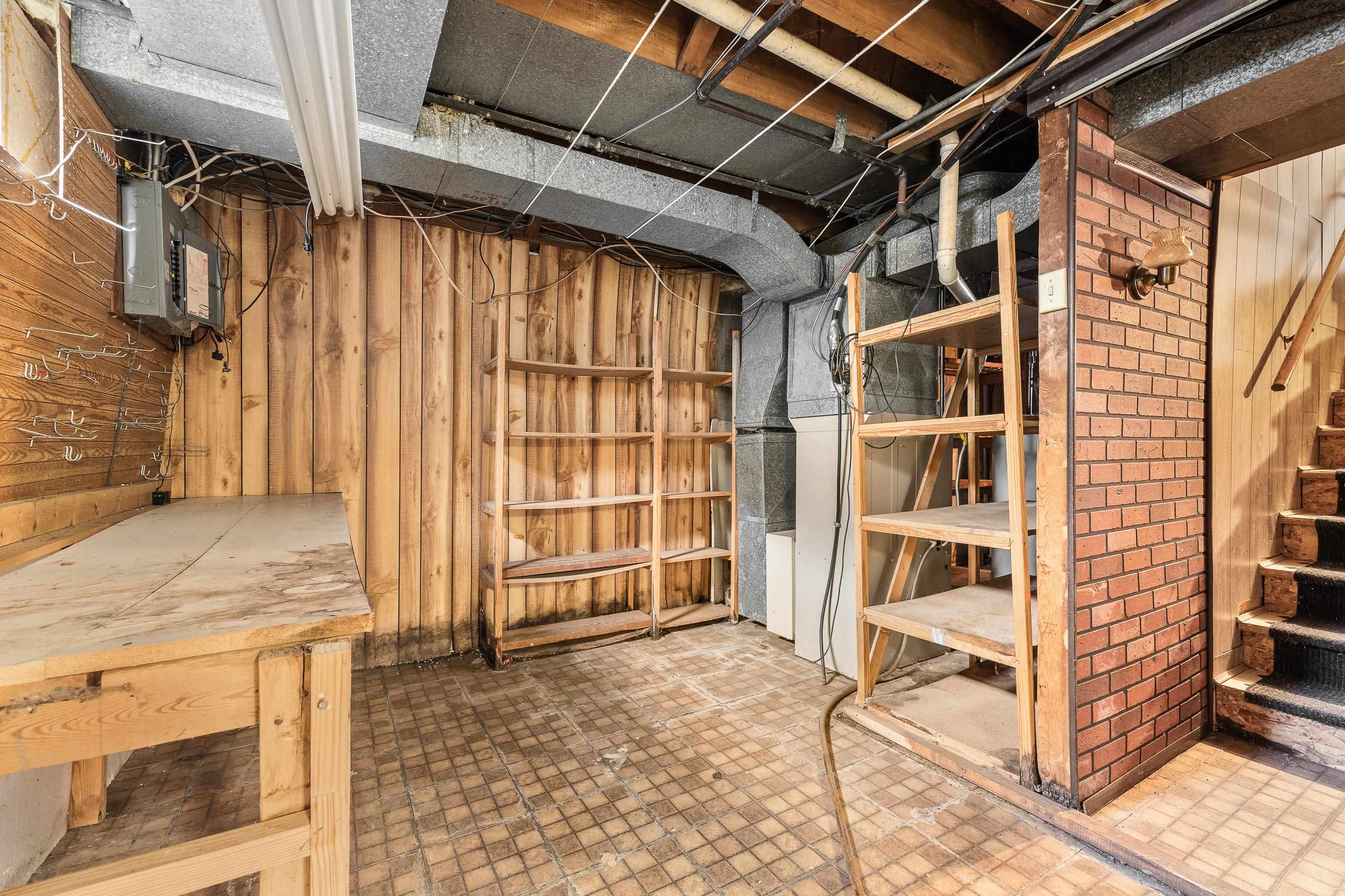 Basement has a workshop area.