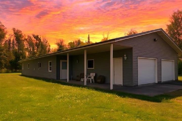 Don’t miss this rare opportunity to own a well-built, energy-efficient ranch-style home with a large pole barn on 10 beautiful acres in the Maple School District. Built in 2007 with quality and efficiency in mind, this home offers over 1,800 square feet of single-level living with 3 bedrooms, 2 bathrooms, and an attached 2-car heated garage. A 40x64 pole barn with power, cement floor, 16X14 garage door with opener, 12’ walls, added in 2008, provides abundant space for equipment, vehicles, and hobbies. Also, with a well-maintained 12X12 sauna, you add even more function and value. The home was designed with comfort and sustainability in mind. Features include Energy Star construction, R29 walls, R60 ceilings, triple-glazed Low-E windows and patio doors, and an electric in-floor heating system with Fantech heat-recovery ventilation for excellent indoor air quality. The open floor plan is thoughtfully laid out for convenience, and the covered 6X24 front porch is the perfect place to enjoy quiet evenings or morning coffee while taking in the private country setting. This property is part of an estate and is being sold as-is. It has been well cared for structurally and mechanically, but it does need some basic cosmetic updates, such as cleaning, organization, and a fresh coat of paint. This property is being sold "As Is," and it is listed below the market-assessed value. Some of the items you see in the home, garage, and pole barn will stay with the property. With just a little work, you can quickly build value while customizing the property to your own taste and needs. Whether you’re looking for a full-time residence, a recreational retreat, or a home with ample storage and workspace, this property delivers unmatched potential at an attractive price point. The acreage offers privacy, space to roam, and the flexibility to create your dream homestead or hobby farm. Private showings are available to view the property and pole barn and assess their features and possibilities.