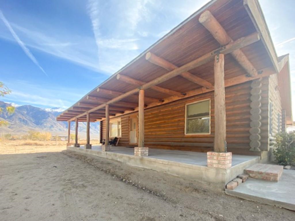 Have you been waiting for a Log Cabin among the Alfalfa fields? Look no further. This Beautiful and rustic log cabin is nestled on over 9.5 acres of land!  And it has been in the same family since 1982!  With amazing 360-degree views of the Sierra Nevada and White Mountains.  Located in Hammil Valley Only about 30 minutes from Bishop!  Features 2 bedrooms one bathroom, Laundry room, And an additional bonus room that can Easily be a 3rd bedroom! Plenty of room With 1,200 square feet of living space.  You will also find a nice size workshop/Garage which is perfect to tinker with your toys!  The hay barn can serve as large RV /trailer or boat storage, to keep them out of the Elements.  The lot is fully fenced and cross fenced. Irrigation lines are already installed to get the ranch up going . Bring all your animals including horses.  Plenty of potential to plant a big garden, fruit trees or just pastureland for your animals!  The possibilities are endless and plenty of elbow room between your neighbors.  Don't miss out on this unique property!