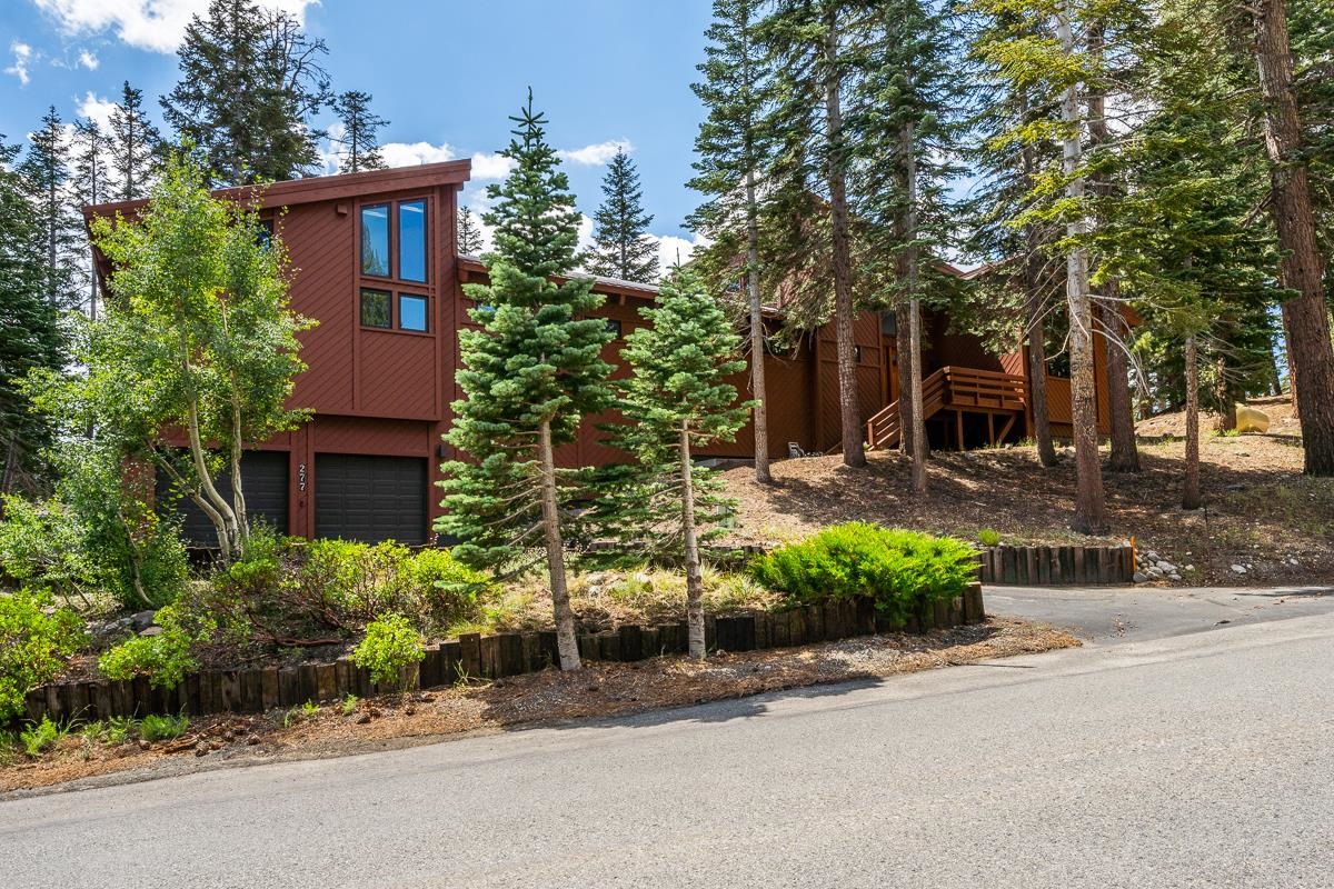 Imagine owning an immaculate 4,734 sq ft custom energy efficient smart home less than one block from The Village at Mammoth.  This home sits on .38 acres - double the size of the average lot.  Complete “Mountain Modern” remodels took place from 2008 – 2016 with impeccable attention to detail.  The split wing floor plan offers space to gather while still having separate private areas for relaxation and an abundance of windows for plenty of natural light and evergreen tree views.    Your dream kitchen in the middle of the floor plan features Miele and Wolf appliances and a large prep island. The primary wing features a spacious living room with pellet stove, dining room with custom glass display cases, generous primary suite with massage tub and bedroom/office with custom desks and cabinetry.  The guest wing includes a large family room with wood burning fireplace and custom glass display case and a separate guest suite with sitting room, two bathrooms and two bedrooms.  The large Trex deck is accessible from either wing.  Custom cherry and birch wood cabinets throughout compliment the bamboo and engineered wood floors.   Thoughtful lighting provides the perfect ambiance for each room and accents the custom museum-grade art hanging system.  Everything you need for daily living is on the main level, while the lower level provides access to wine storage and an 800+ sq ft flex room. This fully finished area with porcelain tile floors offers endless possibilities and opens to a 300 sq ft bonus room with two walls of windows and French doors leading outside as well as a separate mudroom and 2-car attached garage.  Energy efficiency was the key to all aspects of the remodel which includes two multi-zone forced air units, two 50-gallon water heaters with recirculation pumps for instant hot water and a roof ice/snow melt system.  Make an appointment to view your Mammoth Lakes dream home today – and be sure to request a copy of the home features list.