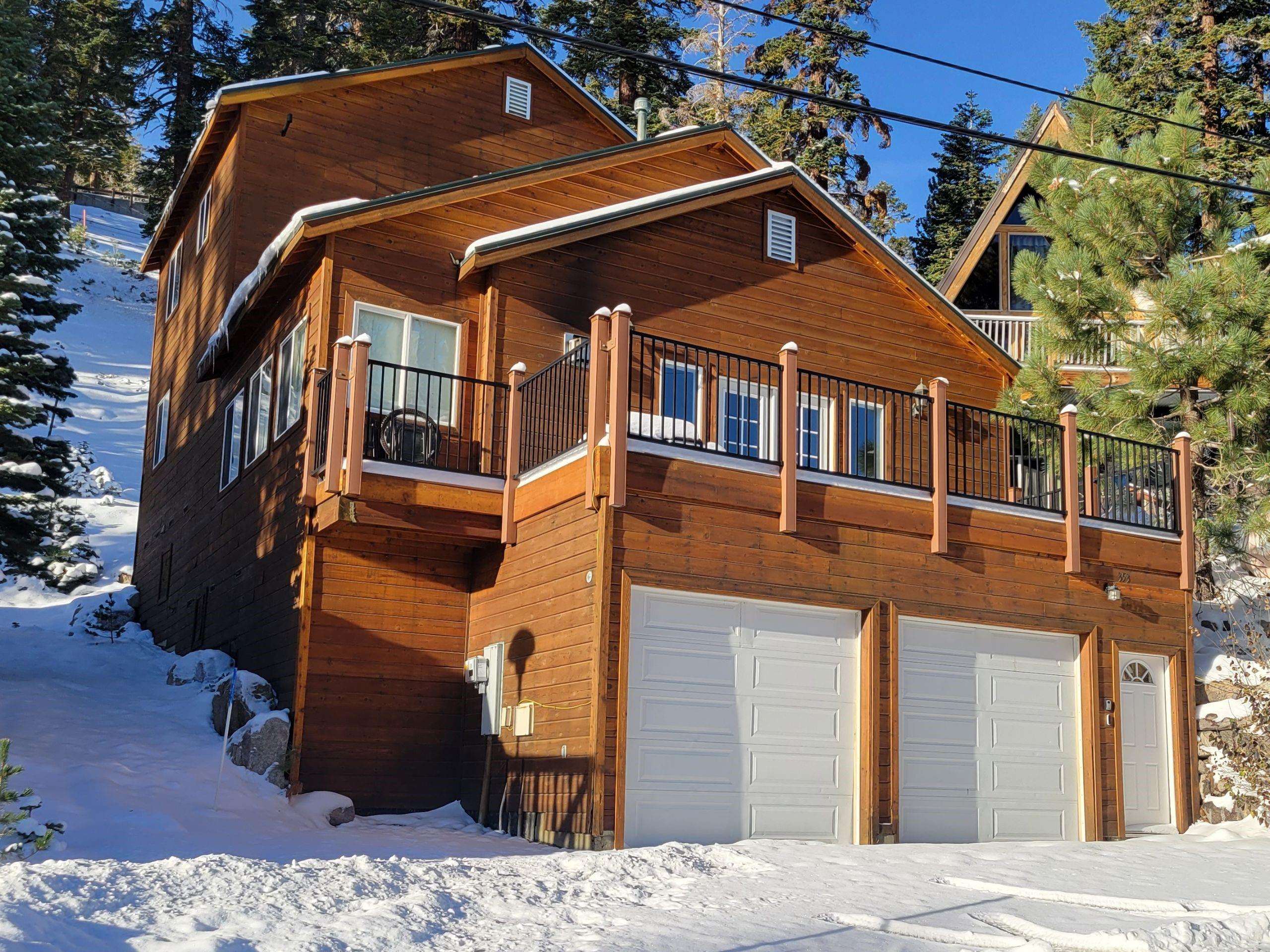 This home has it all – 4-bedrooms | 2.5-bathrooms, attached 2-car garage, large deck, views and is located about 200 yards away from ski-in / ski-out access just above Canyon Lodge.  The home was built in 2002 and offers custom wood floors, a metal roof, dual-paned windows throughout, new Trex decking, brand new hot water heater, new garage door, newer paint, window coverings, gas fireplace and the attached 2-car garage offers plenty of room for covered parking and storage for your toys and gear.  The abundance of windows and the French doors opening up to the deck provide plenty of natural light and allow for the views to be seen from throughout the home.  The large front deck is the ideal place to relax after a day of recreation or sit inside by the fire in the great room as you enjoy spending time with friends and family.  The great room also offers a great work area – ideal for those looking to balance work and play. The home has an amazing layout that will accommodate both large groups and small gatherings.  The property is sold furnished and turn-key – ready for your enjoyment!  The home has been very well maintained and is cared for by an absentee homeowner service while not being enjoyed by the homeowner.