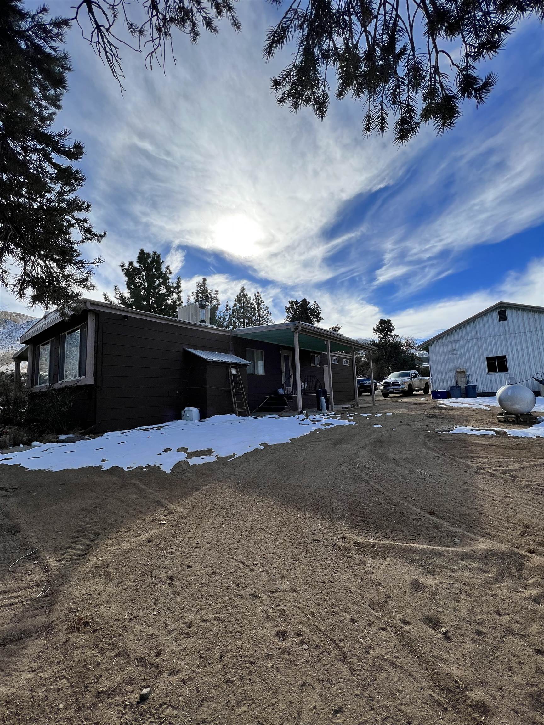 Walker Mini-Ranch on 2 acres. This home has everything you need for country living. Main home is 2 bedroom/2 bath. Oversized Detached Garage and Workshop. Two 1 acre parcels are adjacent and being sold as one.