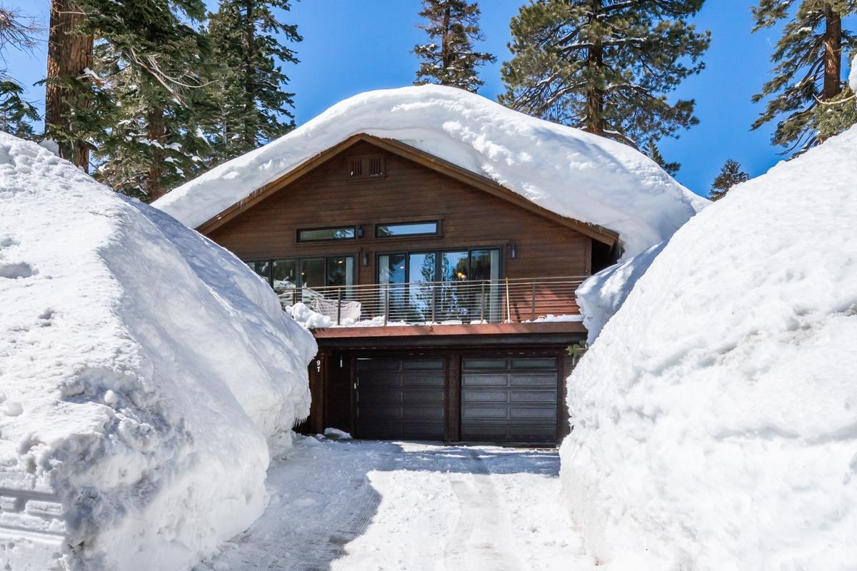 This beautiful custom home was completed in 2016 and is in the ideal location - located 1/2 way between The Village at Mammoth and Canyon Lodge with a beautiful view down Beaver Trail.  No detail overlooked  in this 2 bedroom + study (could easily be converted to a bedroom), 2.5 bath, 3-car garage with bonus area (perfect for workshop, workout area or storage).  Single level living with only the garage,  mud-room, powder bath and storage downstairs.  Vaulted ceilings throughout, 8' Alder doors, Alder window casings and cabinets.  The open kitchen features Alder soft close cabinetry, beautiful Copenhagen granite counter tops and stainless appliances (Dacor gas stove/range, LG dishwasher, Samsung fridge).   Gas log fireplace in the living room and spacious primary suite with 7' x 7' walk-in closet, heated bathroom floor, large shower and separate soaking tub.   The attention to detail continues outside with all-weather TimberTech decks and cable railing (8' x 40' in the front and 12'' x 24' on the south side), gas grill hookup and hot tub in the back.   This home is being sold mostly furnished and is move-in ready!