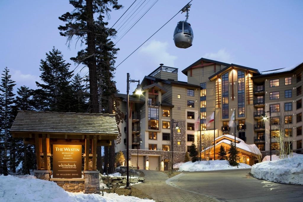 Unique Deluxe studio, A4 floor plan, with larger L-shaped kitchen. Gondola view over entrance to the project.  Prime Location: The Westin Monache is tucked in the picturesque mountains of Mammoth Lakes, making it an ideal base for outdoor enthusiasts. Whether you’re a skier or a hiker, the resort’s proximity to Mammoth Mountain Ski Resort Gondola ensures easy access to snowy slopes in winter and hiking trails in summer. Luxurious Amenities: The resort offers a range of amenities, including a 24-hour Westin WORKOUT Fitness Studio, an outdoor heated pool with views of Mammoth Mountain, and an onsite restaurant called Whitebark. You’ll also enjoy the comfort of Westin Heavenly Beds, flat-screen TVs, and room service in your suite.