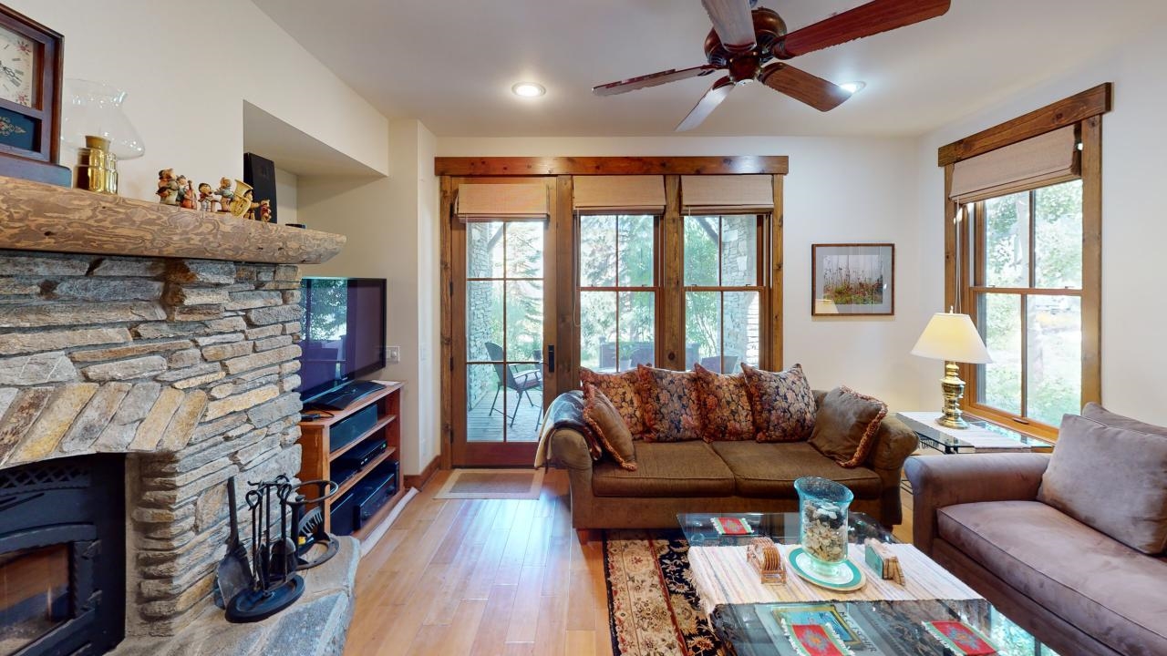 This stunning single story two bedroom features a luxurious open floorplan, a gourmet kitchen, and views of the Sherwin mountains. Surrounded by wildflowers and water features and looking onto Laurel mountain this unit boasts 2 en suite bedrooms plus a powder room, a large primary bathroom with walk in closet, and a covetous mudroom to store all the gear that comes with mountain living. The wood fireplace and elegant hardwood floors adds to the home's warmth and charm while the 1856 square feet, high end stainless steel appliances, and surround sound makes it feel opulent and modern as well. One of the biggest two bedrooms in Mammoth. The condo CAN be rented nightly. This unit is not to be missed.