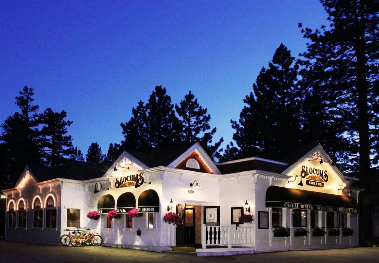 Formerly Slocums Grill and Bar, operated for more than 33 years; One of the best restaurant locations in Mammoth Lakes, situated on the south site of Main Street with 100 feet of frontage.  High demand for restaurants in Mammoth.  Mammoth Has lost over 8 restaurants to new development, leaving a void for quality dining. Great Parking!!!  35 onsite parking spaces with 8-10 public spaces offsite.  4,989 square feet of restaurant space with excellent visibility.  Sale includes real estate, FFE, and Type 47 liquor license.  Restaurant has a maximum capacity of 166-168 persons in 3 dining rooms, as well as a bar.  This location was operated as a local favorite "Slocums Grill and Bar" since 1983 and closed March 2020.  Recent sidewalks installed on Main Street in front of the building. 25-acre housing project (being built by the Town of Mammoth) underway at the southern edge of the property.  Zoning encourages higher mixed-use density.  Free public transportation stop is just steps away from the front door.   Photos were taken pre-covid when the restaurant was in operation and are not necessarily reflective of condition today. Please see video of the property: https://vimeo.com/1035298646  Structure is in need of a remodel.    Facility Restaurant Seating as of March 14, 2020 (pre-covid):  Combined total three Dining Rooms = 82 Combined total Bar stools & seats = 76 Bar “Stand-up” Oak Rails = 8 to 10 Total Dining Rooms & Bar Seats/Stand-ups Combined =166 to 168