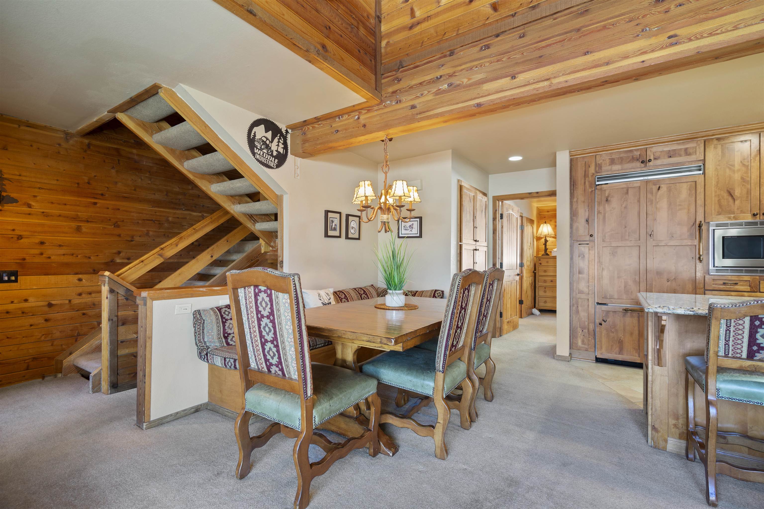 Welcome to Ski Run Villas, a stunning 3-bedroom plus loft, 3-bathroom retreat nestled in the heart of Mammoth Lakes, CA. Perfectly positioned adjacent to the serene forest and just off Lake Mary Road, this home is just a short drive from the iconic Lakes Basin, offering unparalleled access to outdoor adventures year-round. Ideal for families and friends, this spacious home boasts an open and inviting floor plan, featuring a beautifully remodeled chef’s kitchen with high-end appliances, perfect for preparing après-ski meals or family gatherings. The remodeled bathrooms offer a modern, luxurious feel, enhancing the overall charm of the property.  With tons of storage space, you’ll have plenty of room to store your ski gear, toys, and all the equipment needed for your mountain adventures. The two-car garage adds even more convenience and practicality.  Whether you're relaxing by the fireplace after a day on the slopes or enjoying the tranquility of the surrounding forest, this home offers the perfect balance of comfort, convenience, and mountain living. Don’t miss the opportunity to make Ski Run Villas your year-round getaway!
