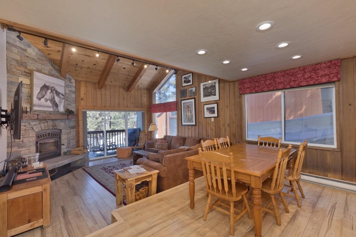Highly desirable end unit with a private garage that is just a short walk to the ski slopes! This townhome has two bedrooms, two bathrooms, private laundry, and no neighbors above, below, or along the eastern wall.  Kitchen has beautiful granite slab counters and upgraded cabinets.  The living space is bright with vaulted ceilings, laminate wood flooring, and a TOML & EPA approved fireplace & hearth. This unit is one of the closest units to Canyon Lodge, just one block from the ski slopes, with partial mountain views to the north. Enjoy a full day on the slopes, après ski at Canyon Lodge, and then walk a couple blocks to Austriahof for dinner.  HOA dues include internet with 400mbs rate. Siding for the Courchevel complex was replaced in 2021.   New electric panels have been installed for this with added wiring for EV car charging in the garage.   See the 3d Walkthrough by clicking here: https://my.matterport.com/show/?m=8RbQQ4xoDgw&brand=0