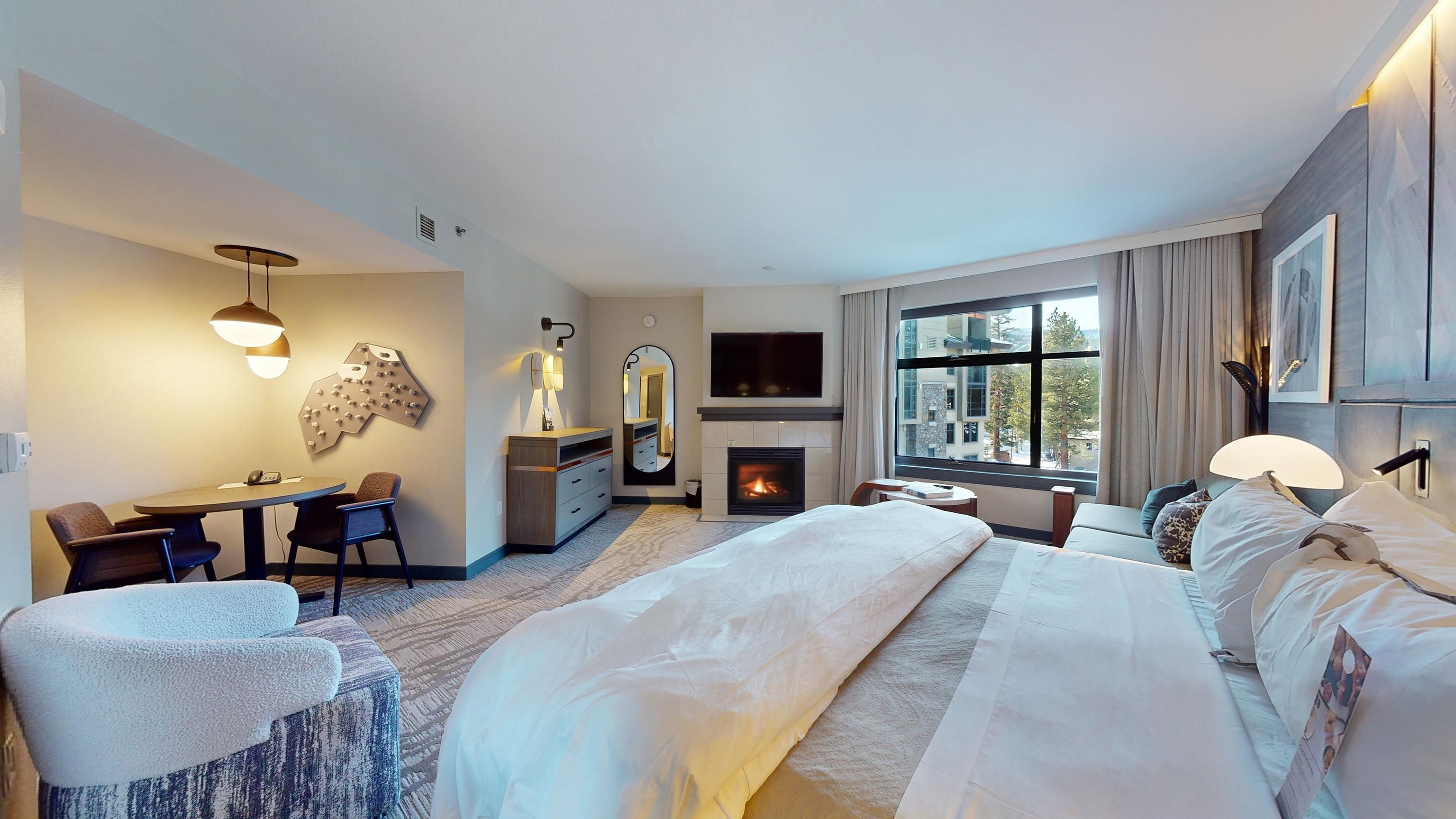 Wow, this is a fabulous spacious studio at The Westin Monache Resort in Mammoth Lakes.  This unit is one of the six deluxe studio floor plans with approximately 512 square feet. Located on the 4th floor, this renovated unit has a prime location given that another unit does not share common side walls, it faces North with nice views that are not obstructed by the Limelight Hotel! The unit features a gas fireplace, two-burner cook top, microwave, dishwasher, Westin’s Heavenly king bed, flat screen TV, sofa bed and mountain modern décor. Amenities include a year-round outdoor heated pool, hot tub, fitness center, owner ski lockers, laundry facility, front desk, restaurant and bar, conference spaces, valet parking, bell service, and underground parking equipped with electric charging stations. Across the street is the Village at Mammoth, with easy access to the Gondola, restaurants, shopping, nightlife and year-round Village events.