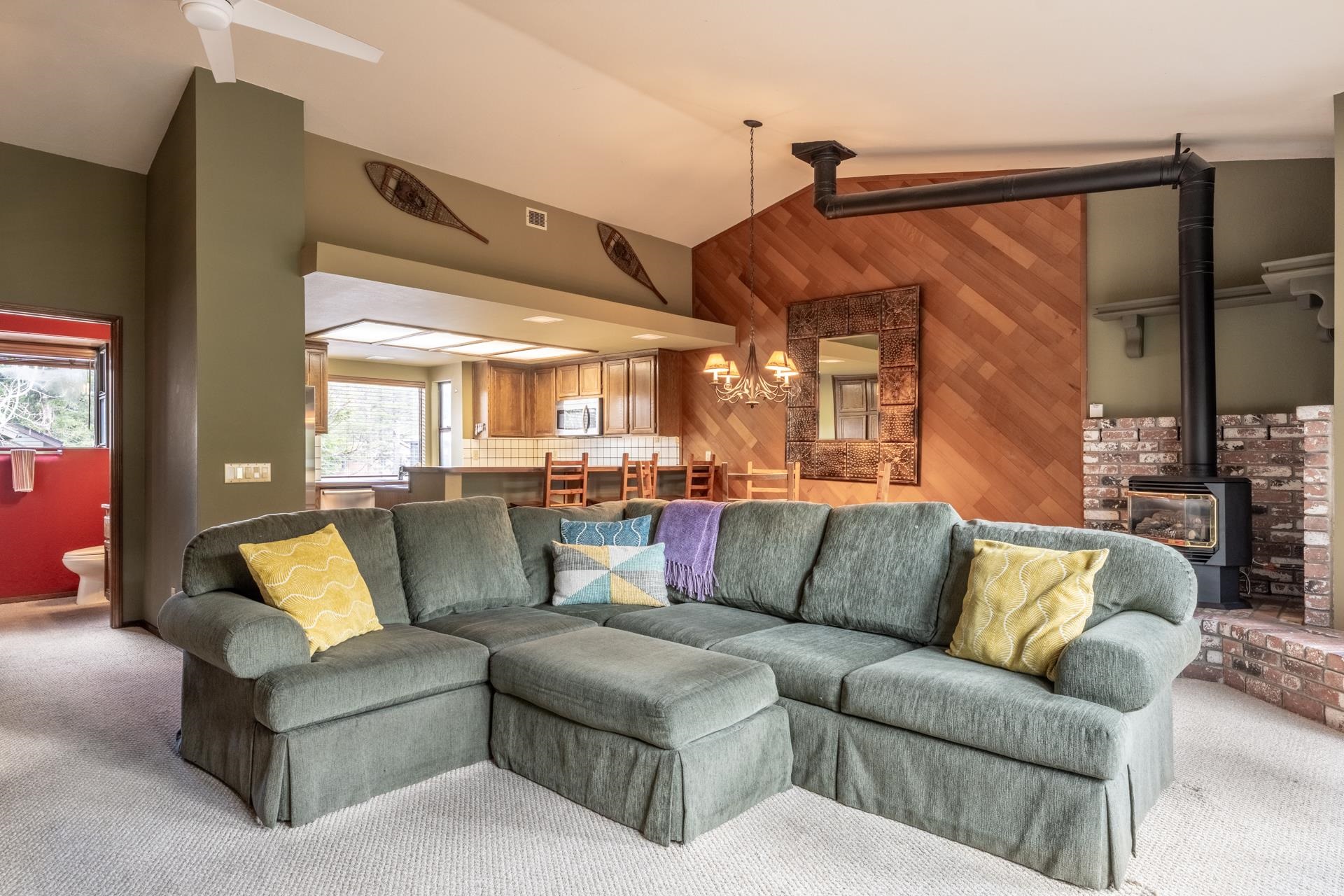 Looking for that perfect Mammoth basecamp? This 2-bedroom, 3-bath townhome in Forest Creek checks all the boxes. Tucked between Eagle Lodge and downtown, you're just a short distance (0.24 miles!) to free public transit and right next to the scenic walk/bike trail—ideal for mountain adventures year-round.  Inside, you'll find a smart two-story layout with two spacious en-suite bedrooms downstairs—one has Queen over Queen bunks and the other has a Queen bed and private outdoor access and a huge storage room for all your gear. Upstairs, the open-concept living space is bright, welcoming, and made for hanging out. The kitchen is stocked with stainless steel appliances (including a newer wine fridge), and there’s a full third bathroom up here too.  "Smart" thermostats and new baseboard heaters.  Step outside and you’ve got options: a sunny open deck for fresh mountain air, or a cozy solarium with a brand-new hot tub for relaxing after a day on the slopes. No upstairs or downstairs neighbors means extra peace and quiet, and recent upgrades (new baseboard heaters, windows, and washer/dryer) make it move-in ready.  Other perks? A gas log fireplace, an outdoor storage closet, and HOA dues that include basic cable and internet. Whether you're looking for a full-time home, a weekend getaway, or a solid investment, this one hits the sweet spot for comfort, location, and lifestyle.