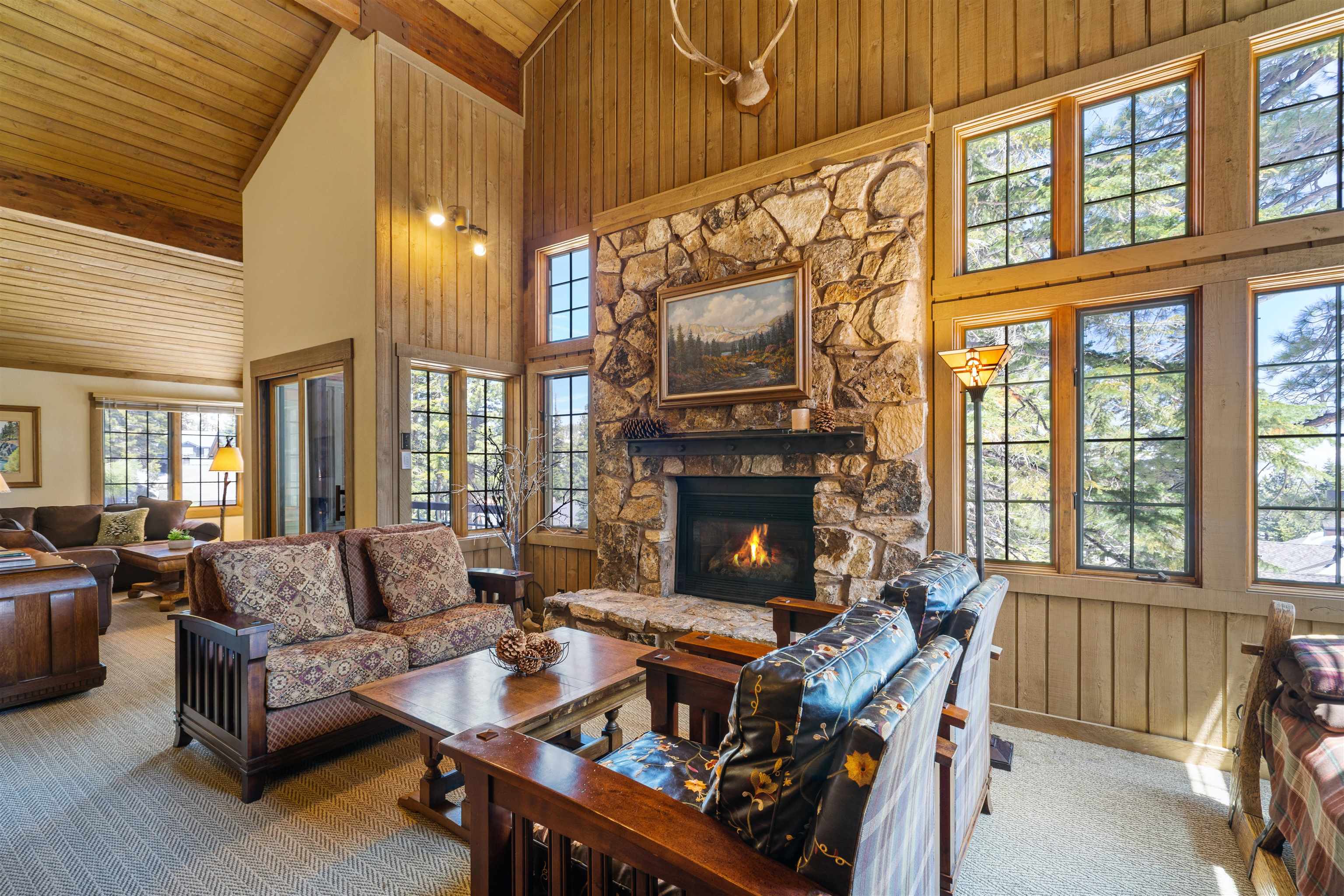 Rare Mountainback 2 Bedroom + Loft, featuring a bonus den and 3 bathrooms.  This fully remodeled property sits perched up on the hillside just down the street from Mammoth Mountain's Canyon Lodge.  Large, oversized living room windows let in beautiful tree and mountain views.  Cozy up to the updated gas log fireplace with stone hearth for a true mountain experience.  This property has a great open floor plan with vaulted ceilings, perfect for entertaining.  Just off the living area you can find a bonus den that can be used as additional sleeping space for two.  Both bedrooms are located on the main floor including the primary bedroom with a custom ensuite bathroom. The open kitchen features wood cabinetry, stone countertops and updated wood flooring. No detail has been overlooked, down to a beautiful metal banister leading to the spacious loft and ensuite bath.  The HOA dues include cable and internet in addition to the amenities. Mountainback is a well-managed complex that features multiple hot tubs, seasonal pool and underground parking.  The town shuttle stop is directly outside of this building for easy access to The Village and town. With the town bike path also just steps away, you'll have a convenient way to explore Mammoth's beautiful surroundings on foot or bike. This well thought-out floor plan has room for all and is truly the perfect mountain getaway.  Call us to view this property today!