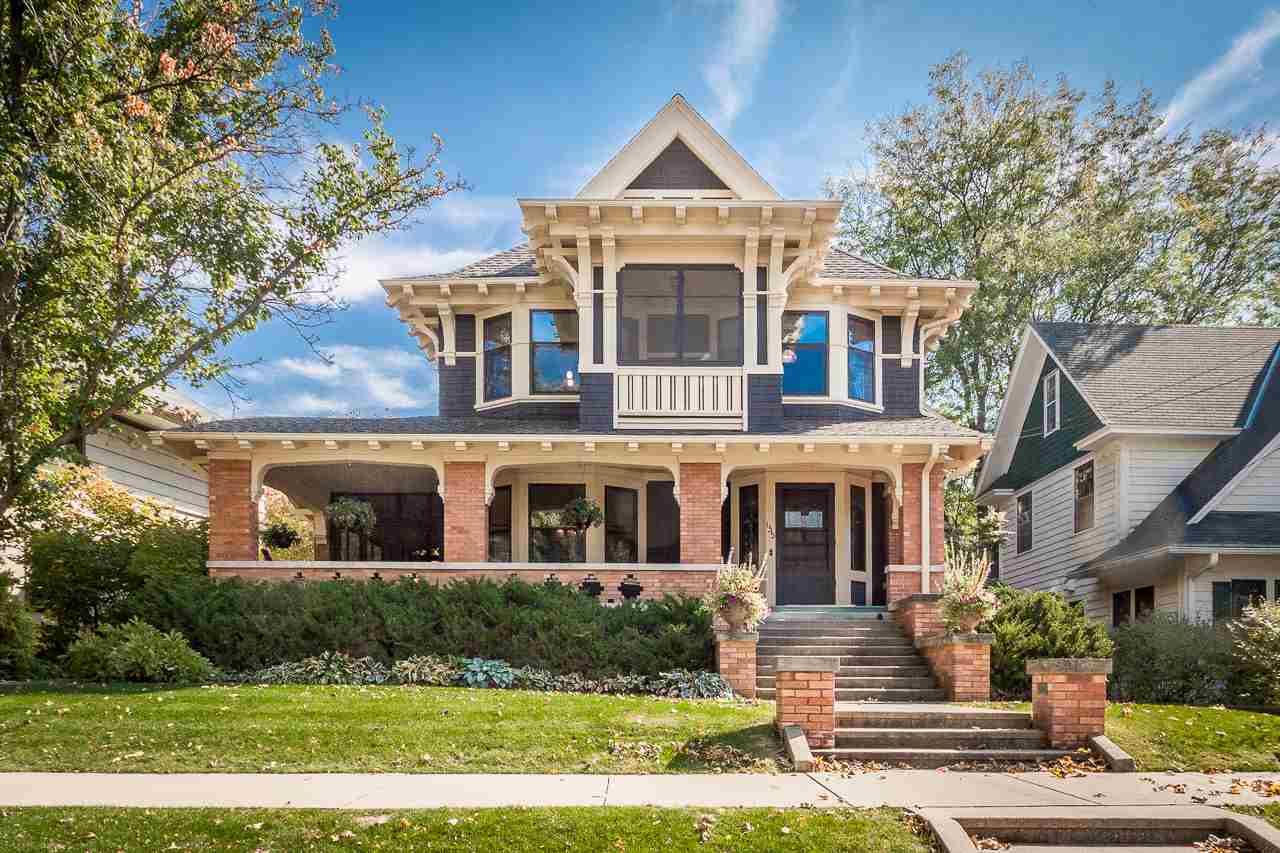This stunning University Heights beauty, designed by renowned architects Claude & Starck, is an exemplary Craftsman style home. Original features, like Art Nouveau stained glass windows, detailed brick work, ceramic inlays & spectacular woodwork speak to the high level of craftsmanship in this meticulously maintained house. High ceilings, lots of windows, & a flowing floorplan add to the livability, as do modern touches like an eat-in chef's kitchen w/butler's pantry, main floor laundry, thoughtfully renovated bathrooms+the attic & LL which have both been remodeled to accommodate additional bedrooms/rec rooms. The main bedroom is a luxe retreat w/a sitting area, sleeping porch & spa bath. Numerous outdoor spaces—4 screen porches,2 covered porches + a patio. 3+ car garage. Luxury defined!