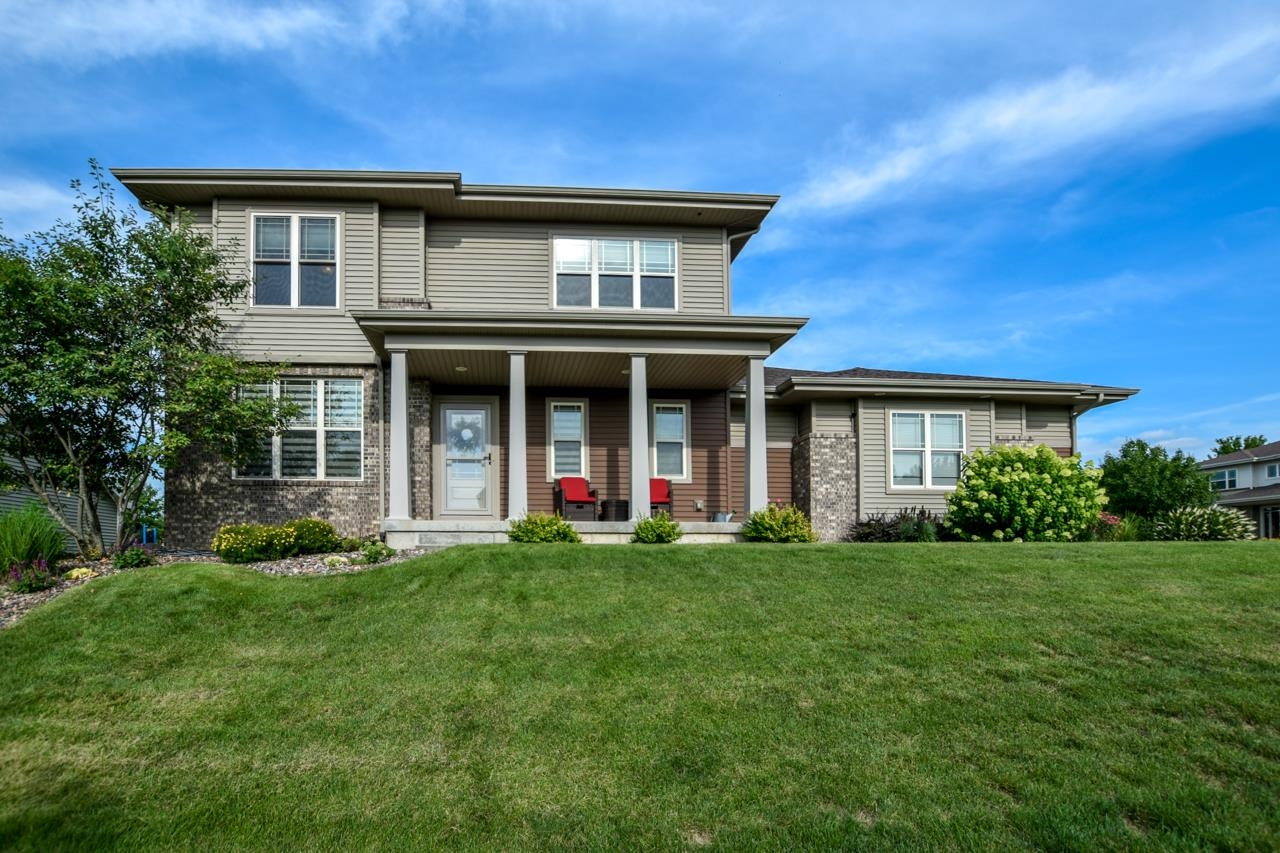Immaculate 4 bedroom, 3.5 bath home in popular Cathedral Point! Featuring Open floor plan, spacious living room w/ gas fireplace, kitchen w/ island, quartz counterops, gas range & french doors leading into den/office. Upstairs boasts Primary suite w/ tray ceiling, full bath, walk-in closet & 3 other nice sized bedrooms! Finished LL w/ exposed windows, Family Room, workout/bonus room (full sized windows/no closet), & Full bath! Sit out on your private patio w/ seated wall, firepit, & arbor while enjoying the perfectly landscaped fully fenced yard! Close to neighborhood park, restaurants, shopping & the new Costco! A Must See!