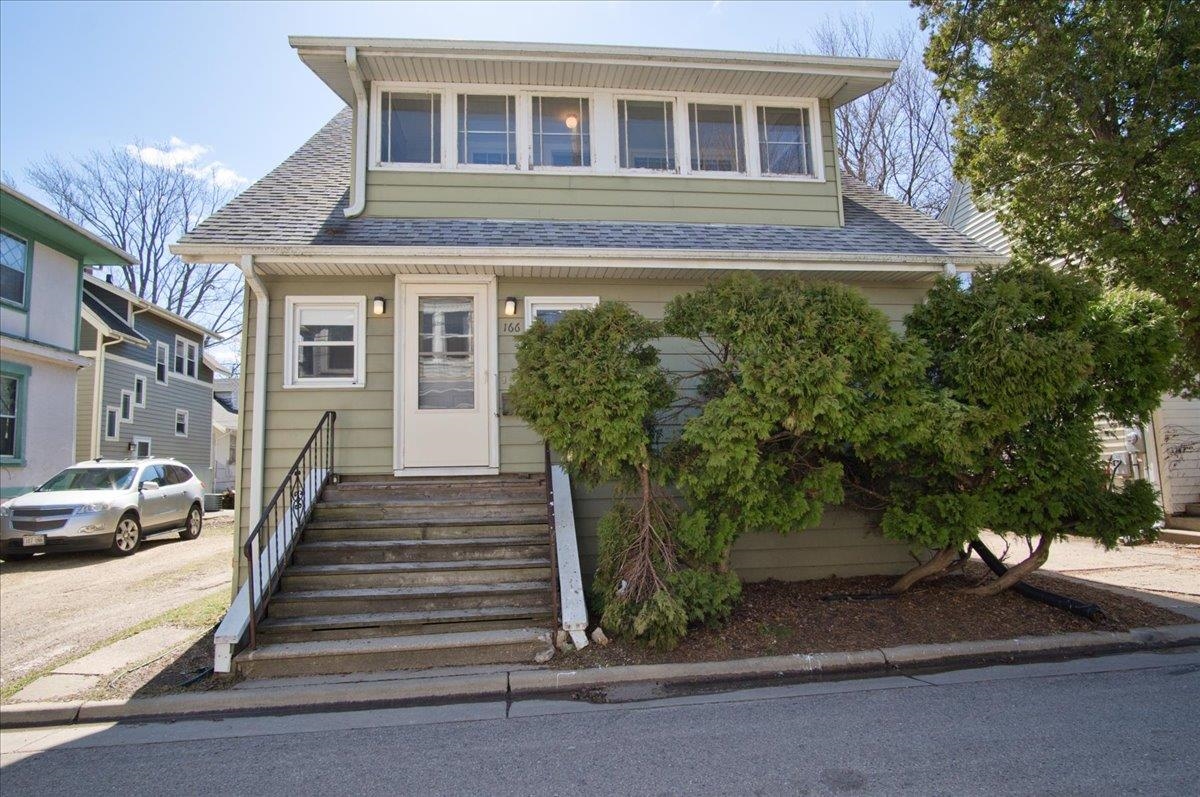 Live in the heart of the city! Less than half a block to Brittingham Bay, close to the Kohl Center and walkable to the Capitol and all that's happening downtown! Absolutely charming 3 bedroom bungalow with porches on two levels. Love the stunning woodwork, gleaming hardwood floors and tons of light through the many windows. Good sized living room and dining room.  3 bedrooms and bath up with sleeping porch. Exposed Rec room in lower level. This could be your perfect home! Fireplace is not functional.