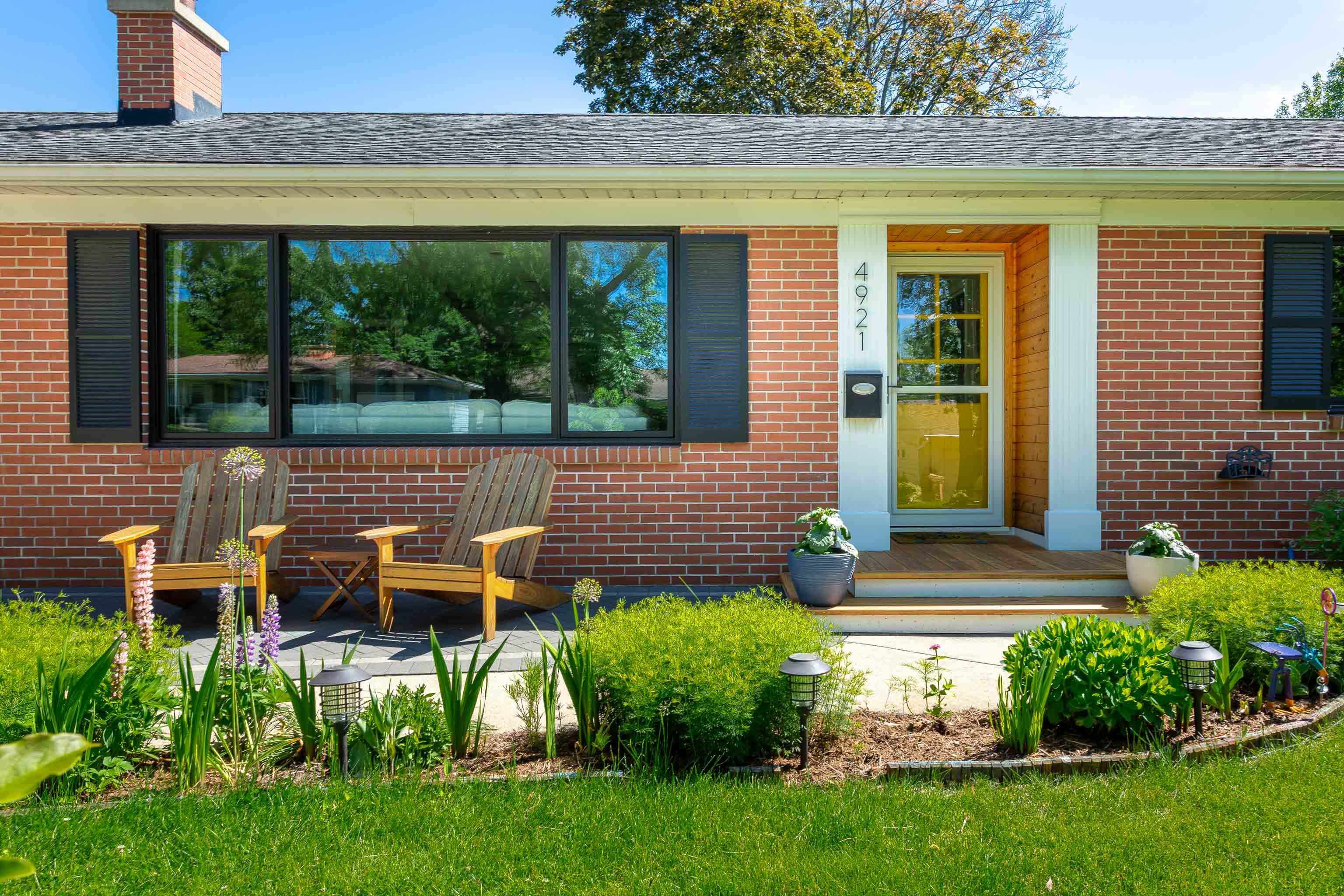 This sweet Midvale Heights neighborhood ranch is a great place to call home. The floor plan flows easily from room to room starting with the sunny living room's gas fireplace & gleaming hardwood floors. A few steps takes you to the sunroom with built-in bookshelves that's just off the bright & cheery kitchen which, is open to the formal dining room. The bedrooms & full bath are down a separate hallway away from the busy living areas. The spacious lower level features a rec room with a built-in bar & a bonus room for guests, exercise equipment or an office, & a full bath. There is plenty of storage space, a laundry room, & a woodworking shop, too! This home is in a great location within walking distance to Van Hise/Hamilton, parks, the library, golf, shopping & dining.
