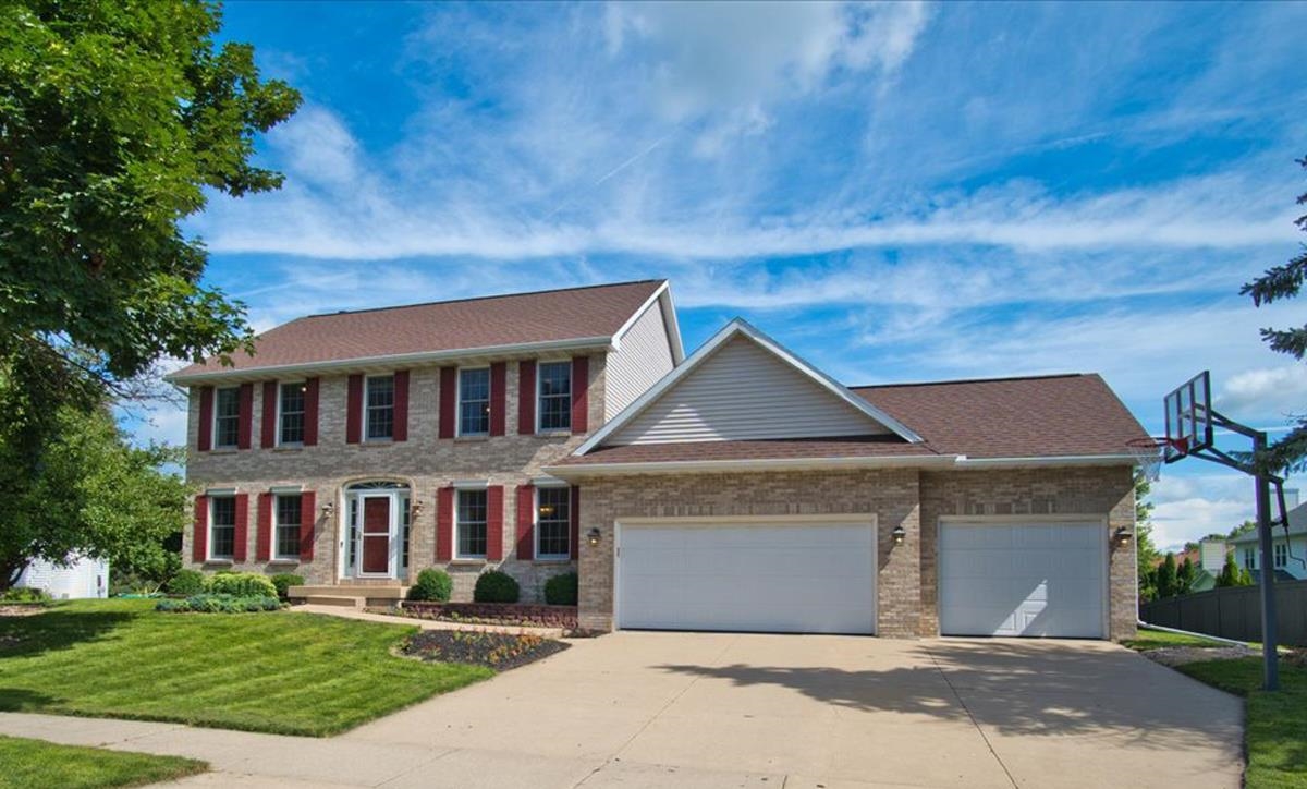 This classic home enjoys an abundance of natural light in each of the wonderful living spaces. The kitchen will delight the Chef with granite counters, tons of storage & a great view!  Entertaining is a breeze with the over sized screen porch & attached deck. French Doors separate the Formal Living Room & large Family Room that stays cozy with a gas fireplace.   Upstairs you'll find the gracious primary suite as well as 3 additional bedrooms & full bath. The lower level wows with a Flex Room, an Exercise Room, & a bright, walk-out Rec Room that opens to the patio & huge backyard.   Enjoy evenings on your custom patio featuring a built-in fire pit.