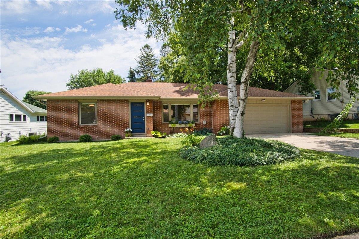 Midvale Heights gem! This well maintained & nicely updated all brick ranch on the near west side is ready for new owners! The living room features a custom mid-century modern inspired divider, huge picture window & original oak floors. The gorgeous hardwood floors continue into the 3 main level bedrooms. The sleek & modern, extra large eat-in kitchen has tons of storage & counter space & opens to the deck & private back yard.  A versatile bonus room off the kitchen can be configured as a dining area, den, family room, & more. The large, level back yard is fully fenced & has a large shed &  several raised garden beds.