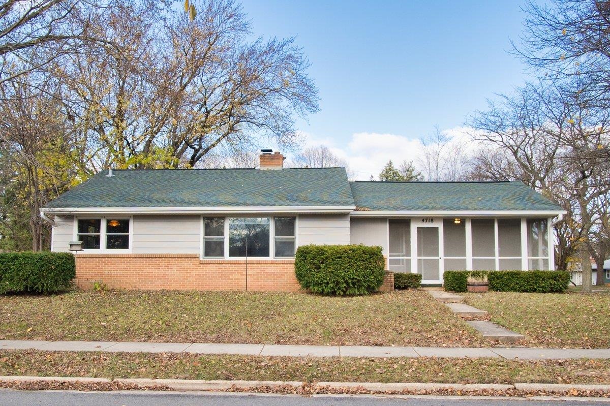 Discover the perfect blend of comfort & convenience in this 2 bed, 1.5 bath ranch located in the desirable Midvale Heights neighborhood.  Nestled on a large, level corner lot, this inviting home offers a spacious layout & plenty of natural light. Watch the activity outside from the cozy living room or listen to nature in the comfortable screen porch. Enjoy the convenience of the attached garage. The lower level includes a studio/ office + a half bath! And still has lots of room for further expansion. Walk to nearby parks, the local library, & a scenic golf course is just moments away.  With easy access to shopping, dining, and top schools, this property is an ideal choice for a vibrant, relaxed lifestyle. It's time to add your creative touches to this delightful home.
