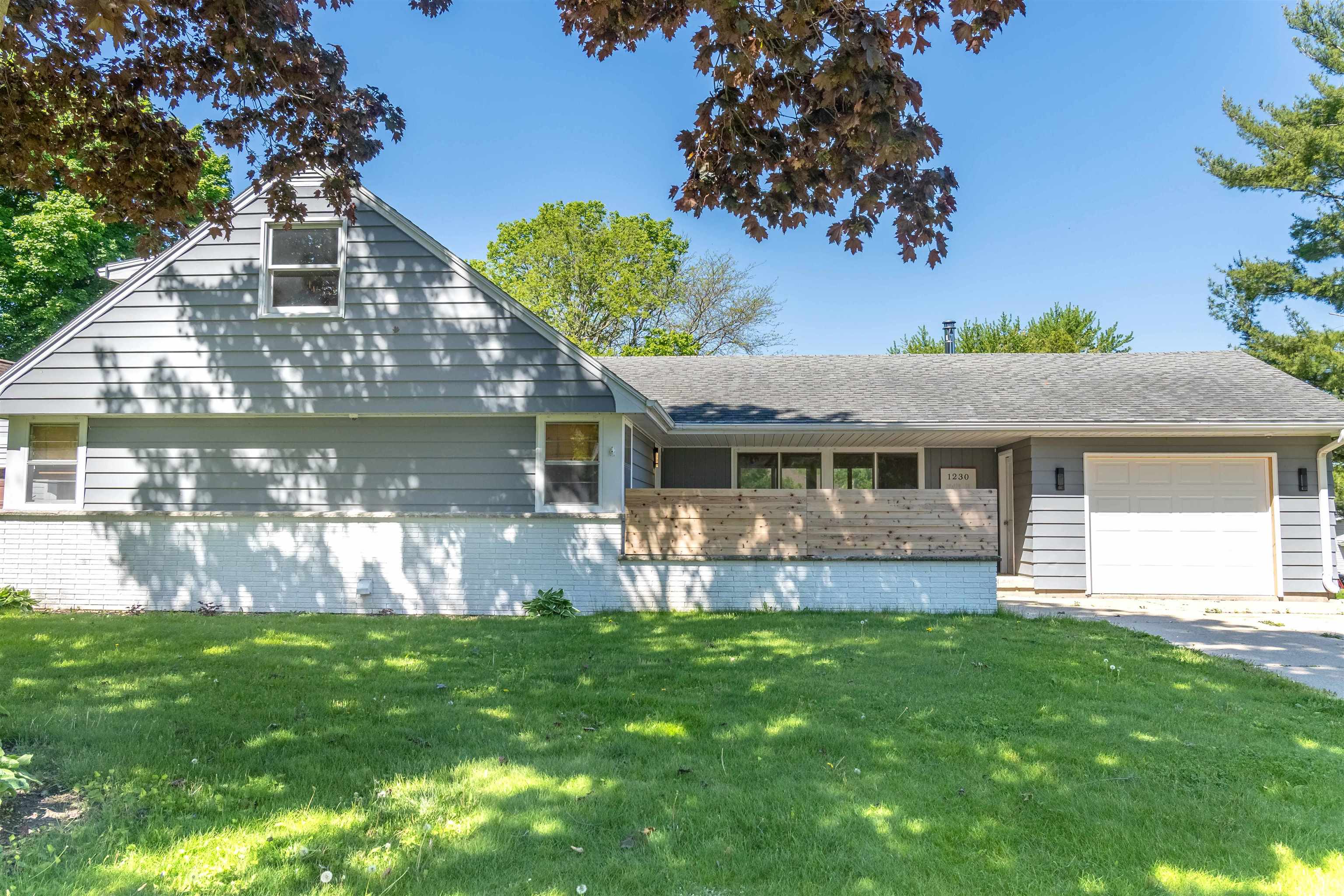 Fully remodeled 4bed home w/stunning Beaver Dam Lake WATERVIEWS! Spacious .37-acre lot w/sunsets, fire pit, garden beds & room to add 2nd attached garage stall. A "stones throw" away from Waterworks Park where you can rent a kayak or other watercraft for the full Lake experience! New cathedral LR ceiling w/exposed beams & (2022) Osburn Stratford II wood stove can heat the whole home! NEW Gorgeous kitchen (2023) w/quartz, soft-close cabs, rollout shelves, SS appliances, subway tile & floating shelves. Main lvl also includes master BR w/double closets, full bath w/double vanity, soaking tub, & laundry (possible move to 4th BR). Fresh finish basement (2022) w/large family room & 2 offices+1/2 bath Updates: furnace (2022), flooring (LVP), new front door, garage door (2024), kitchen window.