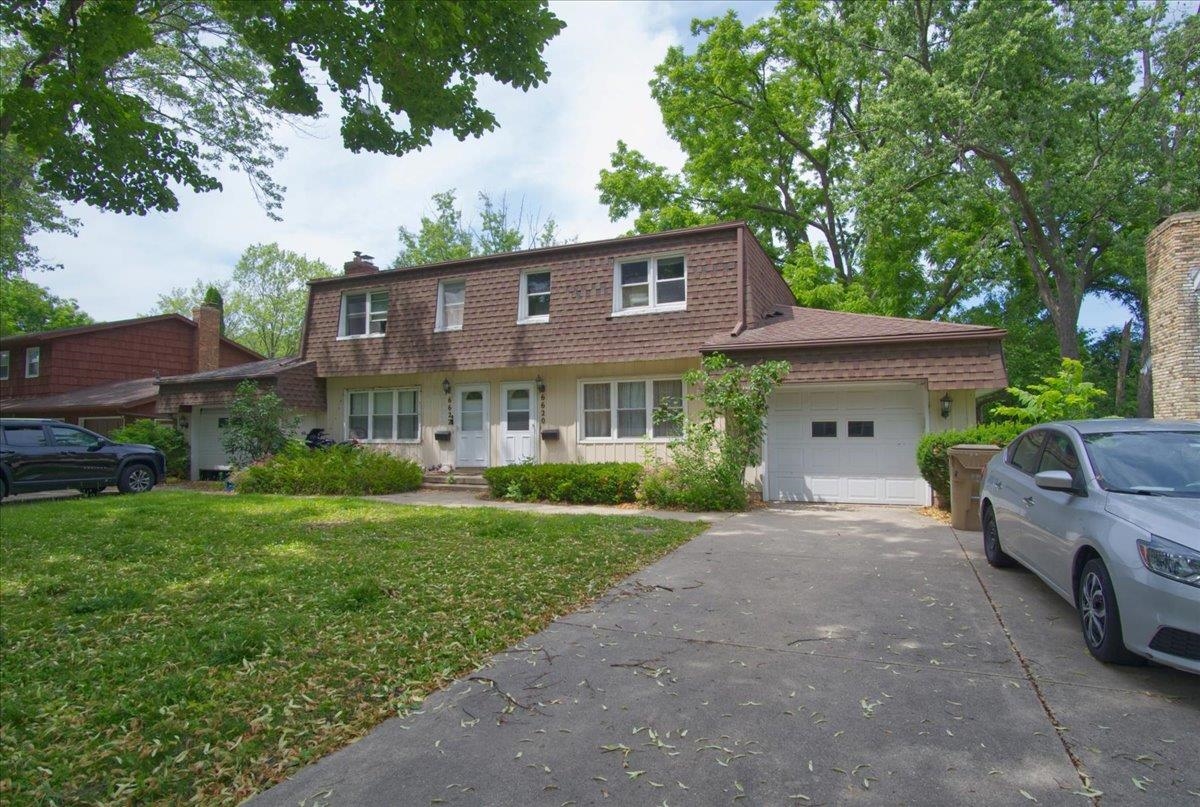 Conveniently located side-by-side duplex offers a fantastic investment opportunity.  Each unit features 3 beds / 1.5 baths, full-private basement & an attached 1 car garage. The spacious light-filled units include a living room, dining room / flex room, eat-in kitchen, powder room, & sliding doors to a private deck. The kitchens feature oak cabinets & generous storage. Upstairs in each unit are three large bedrooms & full bath.  The large level yard is fenced.  With market rents well over $2,000/month, you can easily achieve under a 10x Gross Rent Multiplier, & meaningful cashflow.