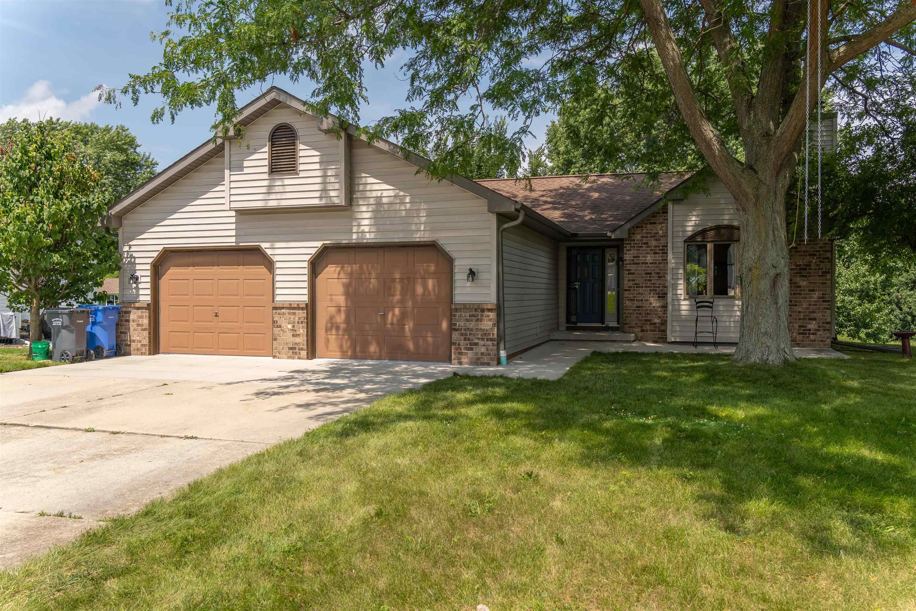 Beautiful & well maintained 5 bedroom/3 bath RANCH with room for all! This lovely ranch home backs up to charming creek. Located on quiet cul-de-sac w/no sidewalks to shovel! Big back deck and newer front patio. Sunny kitchen w/quartz countertops, pantry w/roll out shelves & 2 lazy susans. Lovely Kona colored LVT flooring throughout much of man level. Huge living room w/fireplace! King size master bedroom w/double oversized closets w/organizers & full private bath. LL freshly finished w/ large family room & 2 bedrooms with big windows. Spacious full bathroom in basement has solid wood pocket door. Oversized 2-car garage has beautiful epoxied floor and is insulated & has pull down attic stairs for add'l storage. Insulated exterior foundation. Deck painted July 2025. Great floor plan!