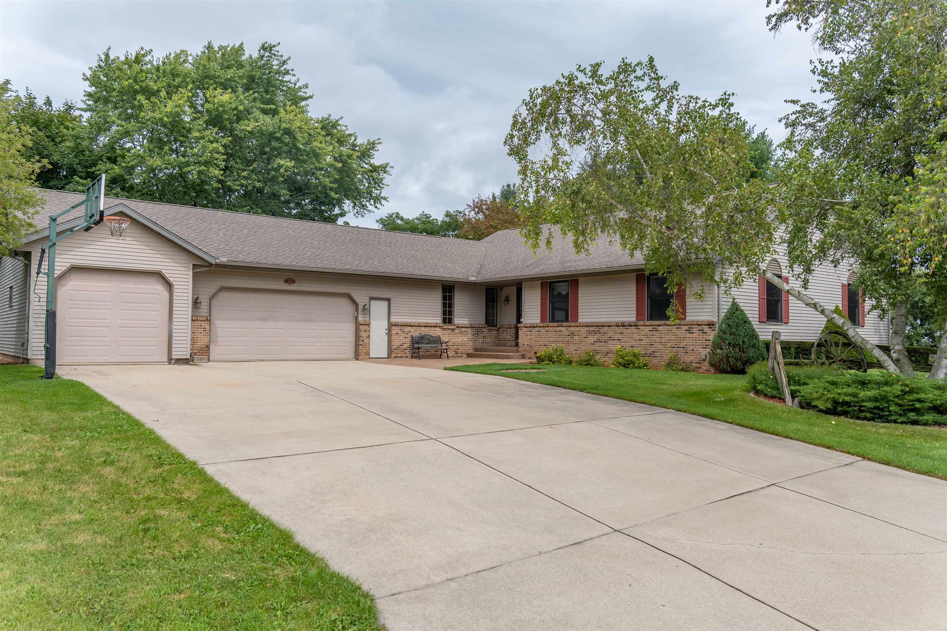 Rare oversized RANCH w/ 3,393 fin sqft on .39-acre lot in quiet Columbus neighborhood! Vaulted ceilings. Kitchen cherry cabs, granite, SS apps, brkfst bar, pantry w/rollouts. Flex DR/office, main level remodeled laundry (’22), king-sized primary suite, updated baths, & LVP flrs (’21). LL features huge FR, gas Fireplace, wet bar, 4th Bedrm, full bath w/heated floor, & tons of storage. 4 car tandem garage w/X tall door & basement access. Maint-free deck, covered front porch, extra pad for boat/trailer. Insulated foundation. Solid wood doors, radon system, hot tub. Bow window, inlaid real wood floors, wide halls, tons of natural light—move-in ready! Great layout, quiet street, close to schools, parks, & quick access to Hwy 151 for commuters. Great yard! Truly a one-of-a-kind home!