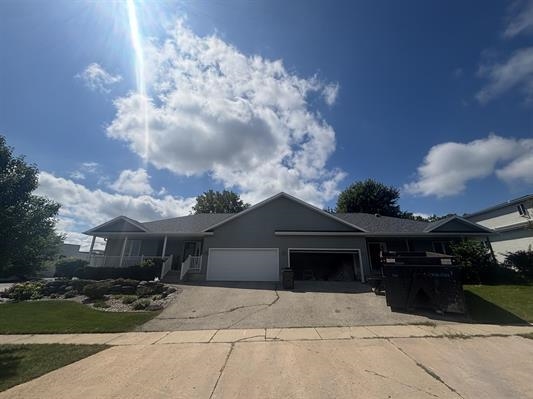 COMPLETELY renovated half-duplex ranch just steps from downtown Lake Mills. Fully rebuilt, $419K in work including new roof, siding, windows, insulation, electrical, plumbing, furnace, A/C, water heater/water softener. 3BR/3BA, over 2,000 sq ft. finished space. Chef's dream kitchen w/granite countertops, oversized sink, large island, quality cabinets, soft-close dovetail drawers, induction cooktop & Wolf oven. Main lvl features cathedral ceilings, 2 master bedrooms w/walk-in closets, private bathrooms! Main lvl laundry room includes washer/dryer & handy built-ins. Exposed LL offers huge rec room, Bedroom & full bath. LVP floors thru-out. Large 2-car garage, covered front porch, new deck w/gazebo materials, arborvitae privacy fence. NO CONDO FEES! Complete 10/25. Stunning! Make it yours!