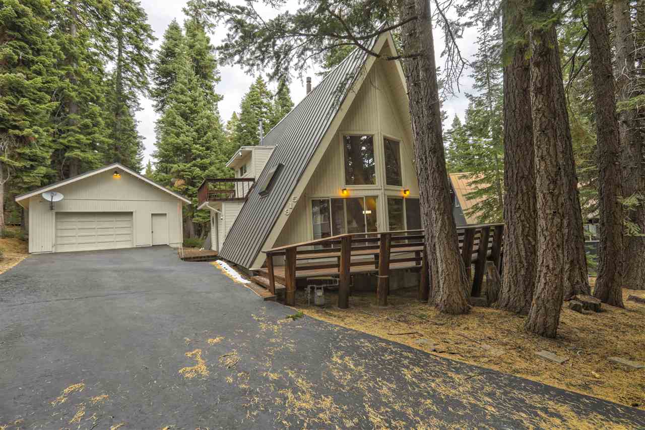 Awesome location for the outdoor enthusiast! Steps from hiking, mountain biking, snowmobile, xc ski trails & bike path. Large lot and approximately 670 sq/ft garage to store all of your toys. Centrally located to Tahoe City & Kings Beach. Snow removal included for 20/21 winter season. Granite countertops in the kitchen. Furnace & water heater replaced within the last 6 yrs. All windows upgraded. Wood fireplace upgraded to gas 2 years ago. Has smart lock & smart thermostat.   Property is virtually staged.